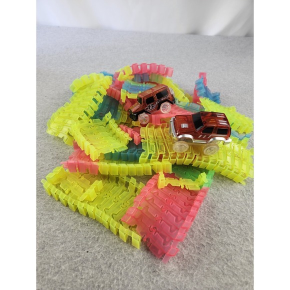 Magic Tracks Other - Lot Of Magic Tracks With 2 Iight Up LED Trucks Battery Operated Cars
